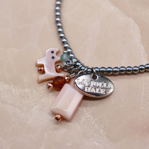 【Open the Jewelry Box!】オレンジガーネット×クィーンコンクシェル×ピンクシェル×シルバーヘマタイト ブレスレット